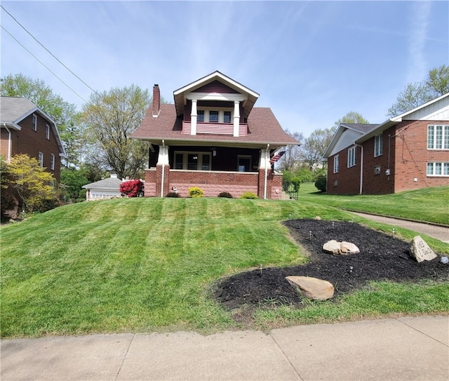 view of front of property with a front lawn