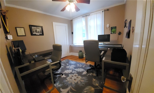 home office featuring hardwood / wood-style flooring, ceiling fan, and ornamental molding