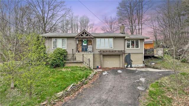 view of front of house with a garage