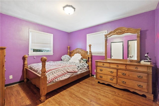 bedroom with light hardwood / wood-style floors