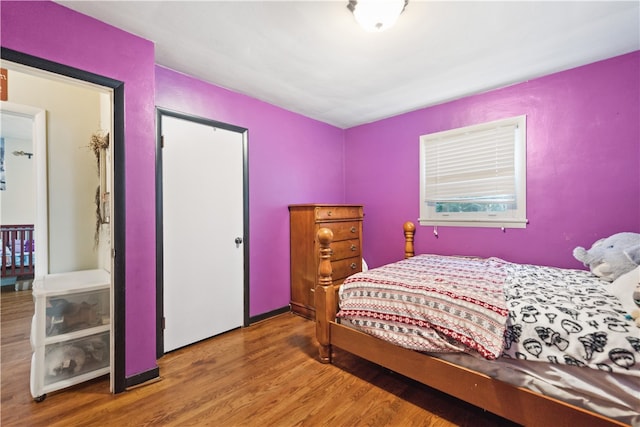 bedroom featuring hardwood / wood-style flooring