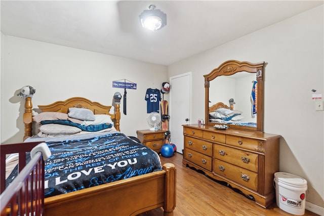 bedroom with light wood-type flooring