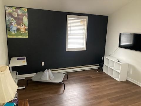 sitting room featuring hardwood / wood-style flooring