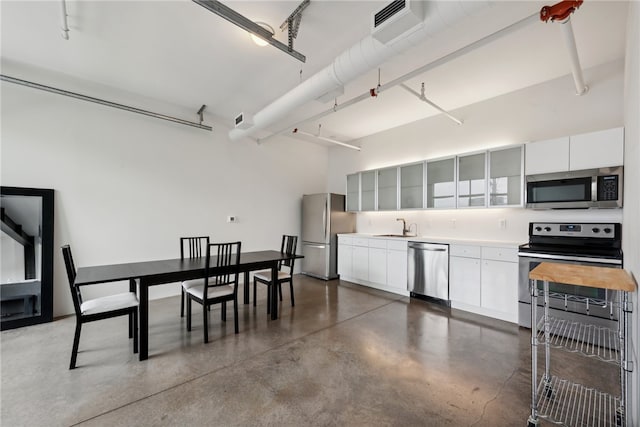 dining area featuring sink