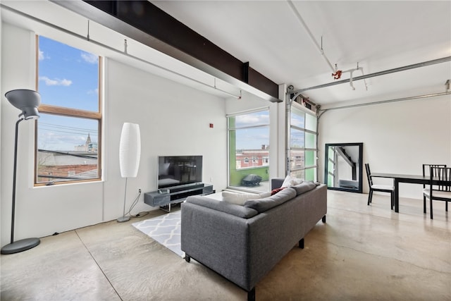 living room featuring plenty of natural light