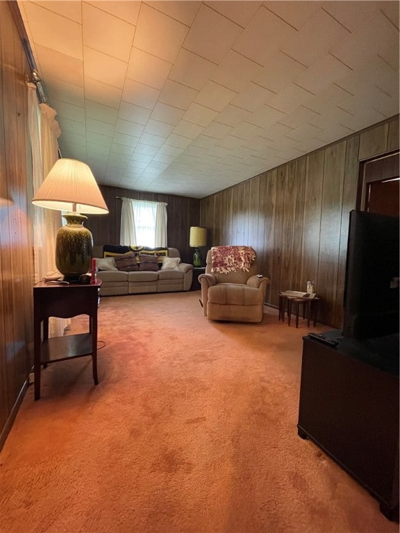 living room with wooden walls and carpet floors