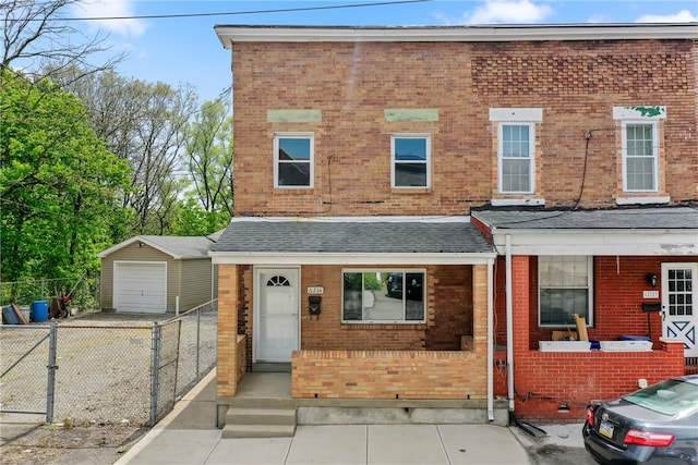 multi unit property with an outdoor structure and a garage