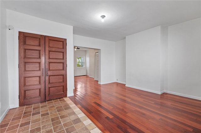 foyer entrance with wood-type flooring