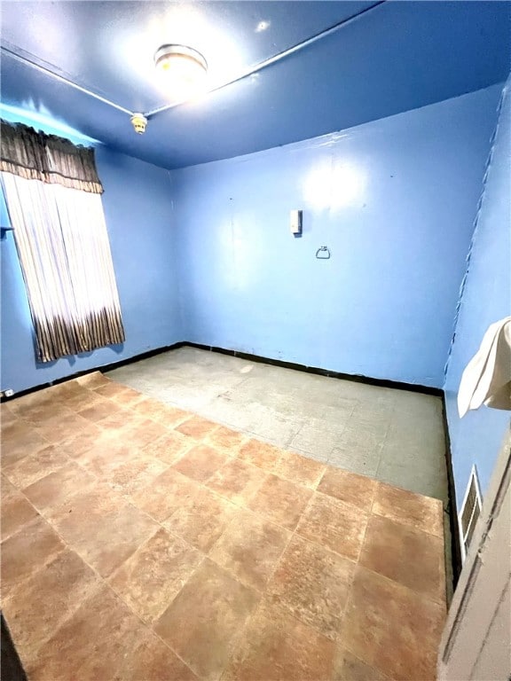 view of tiled empty room