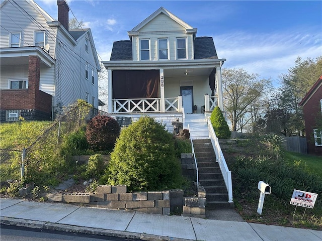 view of front of home featuring covered porch