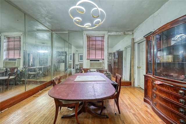 interior space with light hardwood / wood-style flooring and a notable chandelier