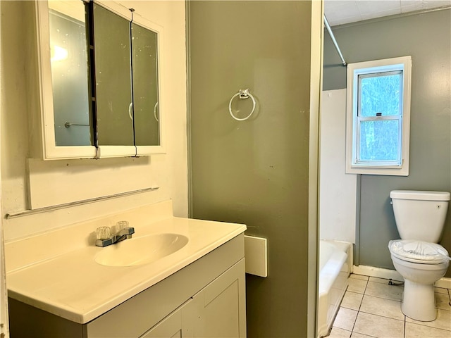 full bathroom featuring tile patterned floors, bathtub / shower combination, toilet, and vanity