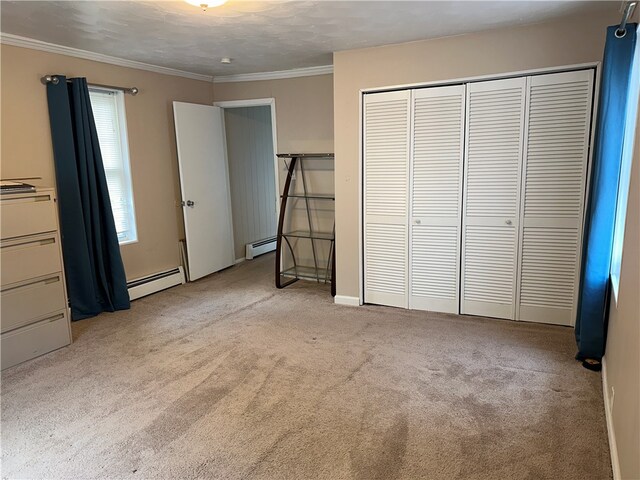 unfurnished bedroom featuring ornamental molding, carpet floors, and a baseboard radiator