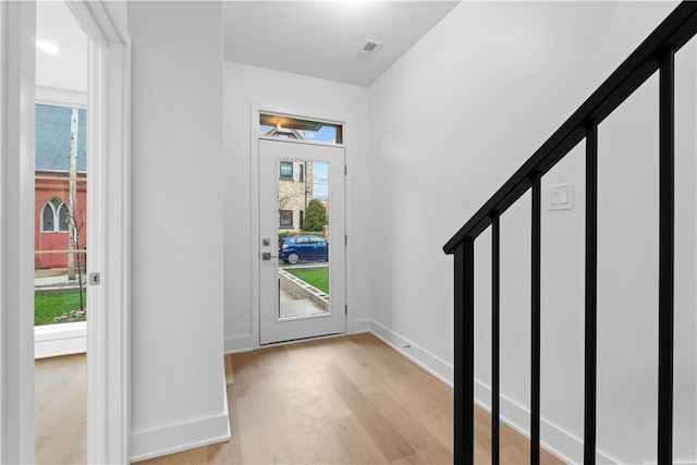 entrance foyer with a healthy amount of sunlight and light wood-type flooring