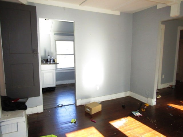 empty room with hardwood / wood-style flooring