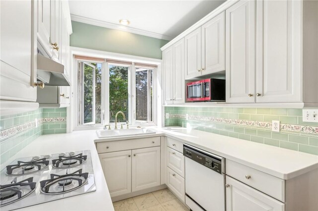 kitchen featuring white cabinets, white appliances, crown molding, and sink