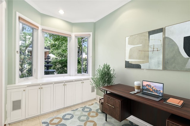 office space featuring light tile patterned floors, ornamental molding, a wealth of natural light, and recessed lighting