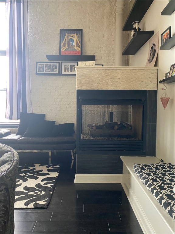 living room with dark wood-type flooring