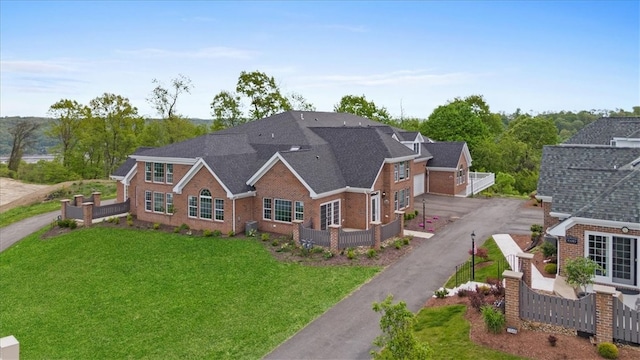 view of front of home with a front lawn