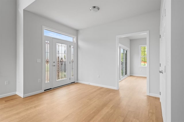 empty room with light wood-type flooring