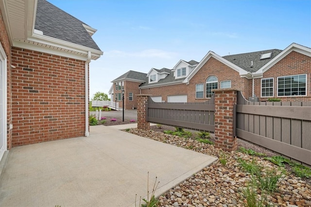 view of patio / terrace with a garage