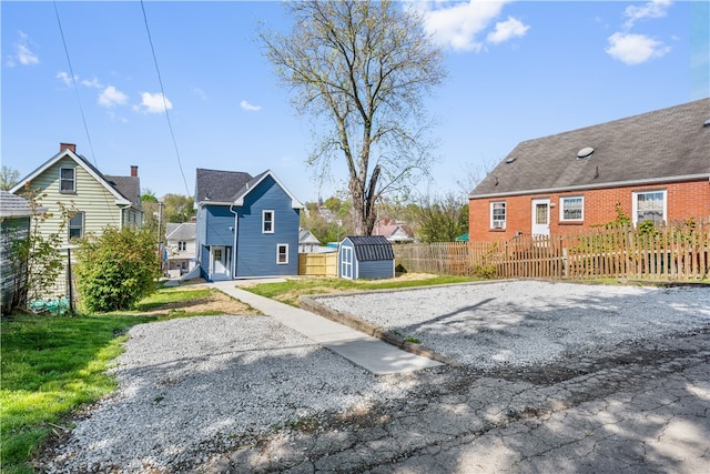 view of yard with a storage unit