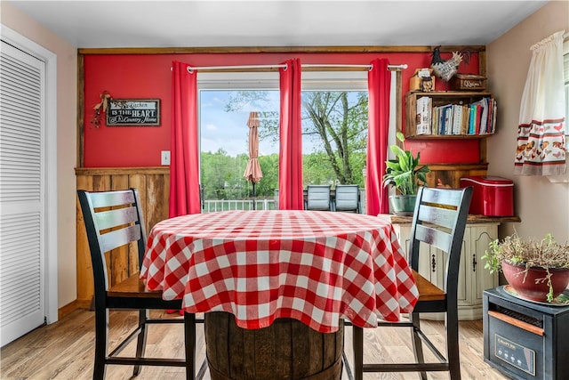 dining area with hardwood / wood-style flooring