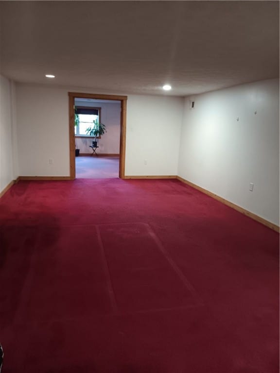 empty room featuring carpet flooring