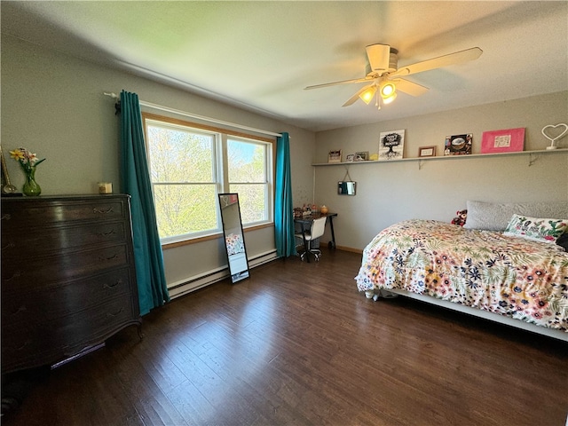 bedroom with dark wood-type flooring, a baseboard radiator, and ceiling fan