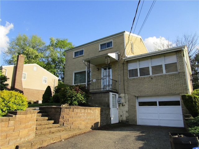 view of front property with a garage