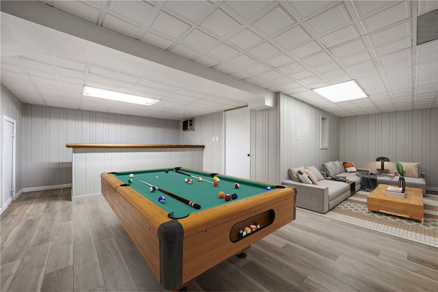 recreation room featuring wood walls, hardwood / wood-style floors, and billiards