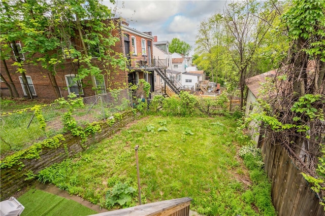 view of yard with a deck