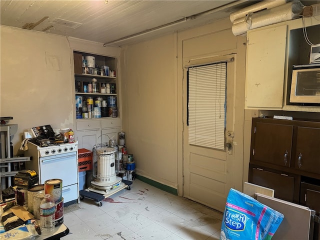 miscellaneous room featuring light tile floors