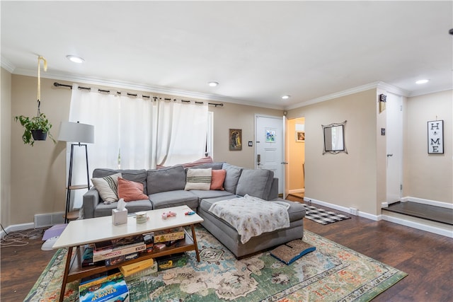 living room with crown molding and hardwood / wood-style flooring