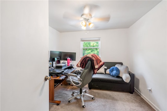 carpeted office with ceiling fan