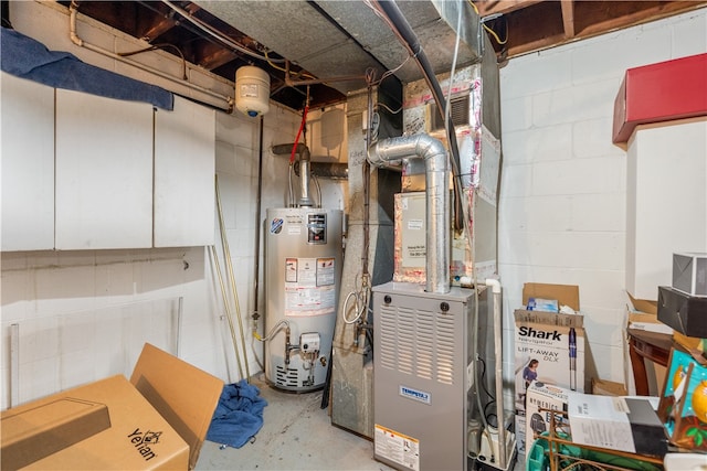 utility room featuring gas water heater