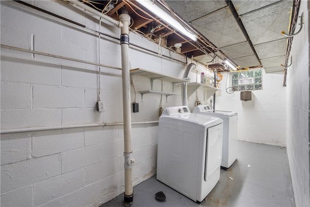 laundry room featuring washing machine and dryer