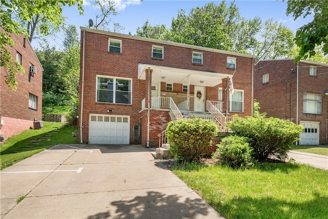 view of property with a garage and central AC