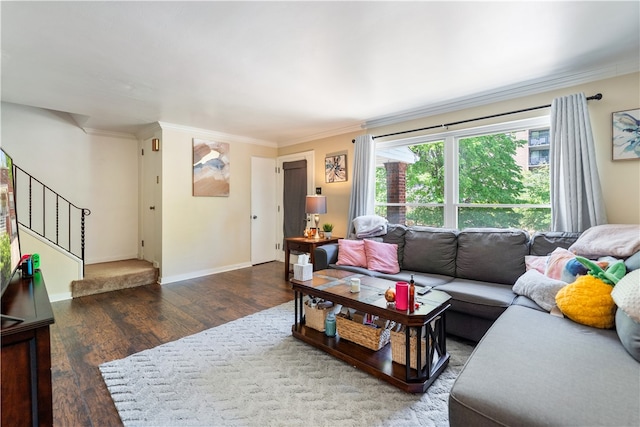 living room with crown molding and hardwood / wood-style flooring