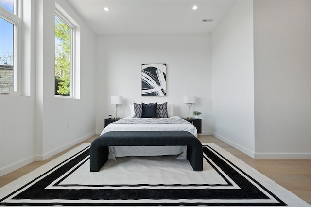 bedroom with light wood-type flooring