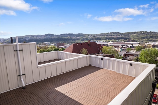 balcony featuring a mountain view