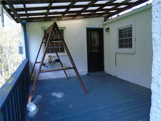 wooden terrace featuring a pergola