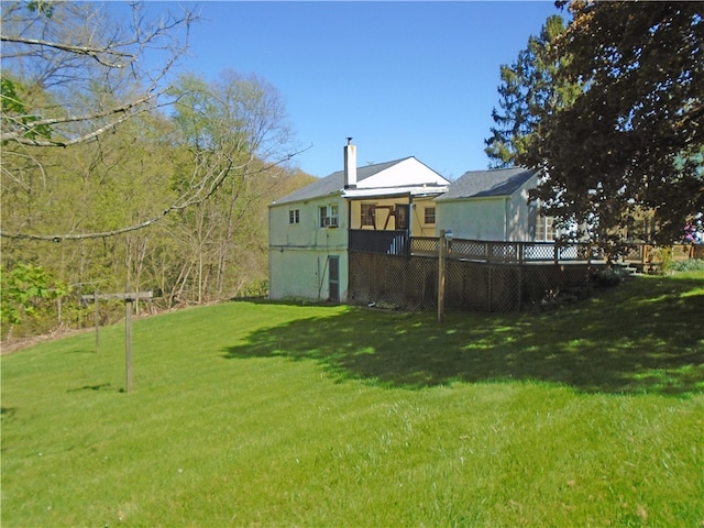 view of yard featuring a wooden deck