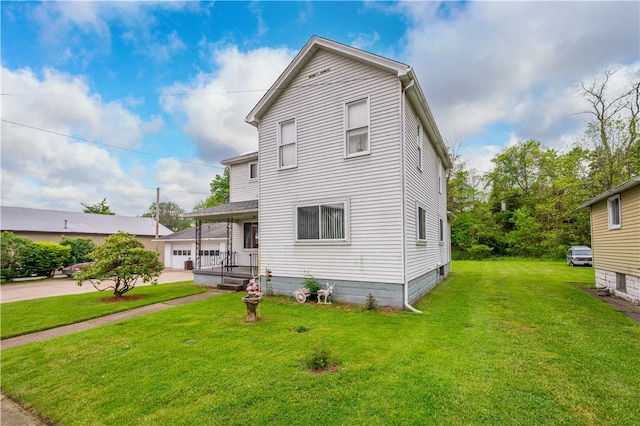 exterior space featuring covered porch and a front lawn