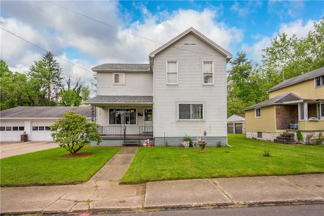 front of property featuring covered porch and a front yard