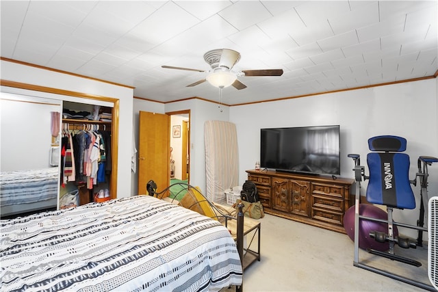 bedroom featuring a closet, ceiling fan, and carpet