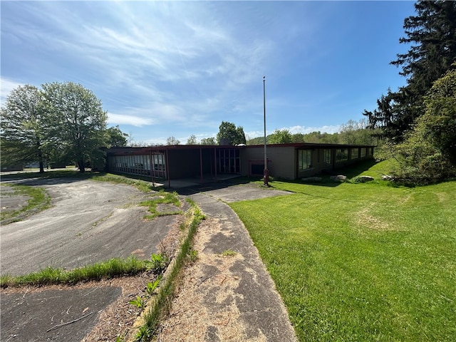 view of yard with a carport