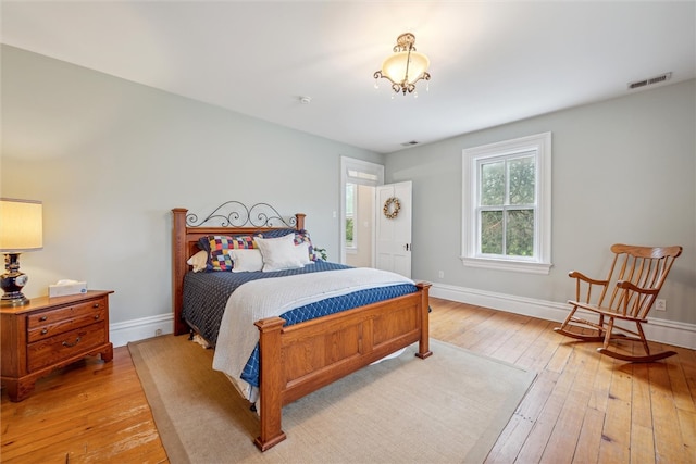 bedroom featuring hardwood / wood-style flooring