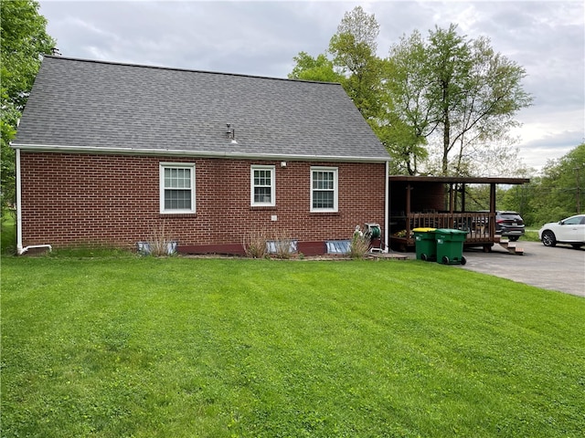 view of home's exterior with a yard