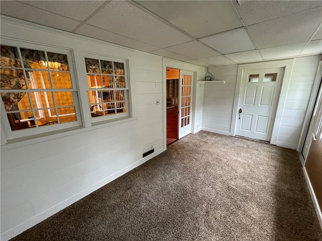 interior space with a drop ceiling